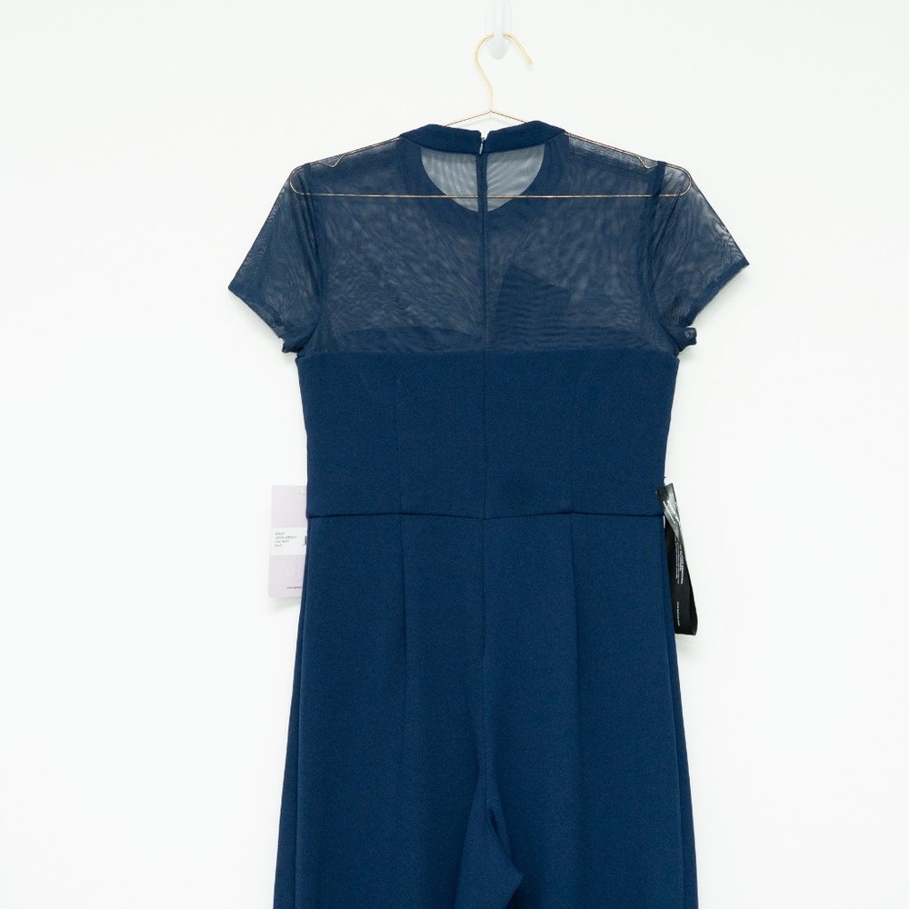 JS Collections - Stretch Crepe Illusion Neck Bow Jumpsuit - Picture 7 of 9